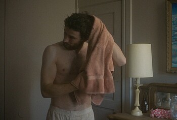 Josh O'Connor shirtless in The Mastermind