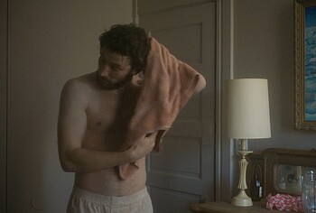 Josh O'Connor shirtless in The Mastermind