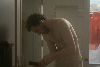 Josh O'Connor shirtless in The Mastermind