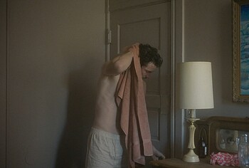 Josh O'Connor shirtless in The Mastermind