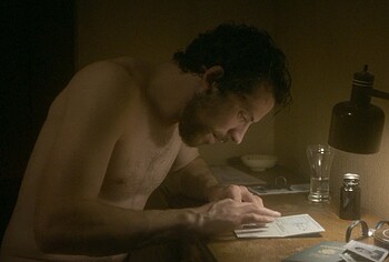 Josh O'Connor shirtless in The Mastermind