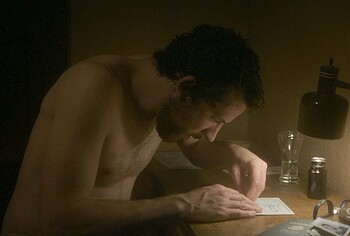 Josh O'Connor shirtless in The Mastermind