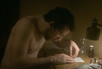Josh O'Connor shirtless in The Mastermind