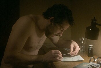 Josh O'Connor shirtless in The Mastermind