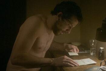Josh O'Connor shirtless in The Mastermind