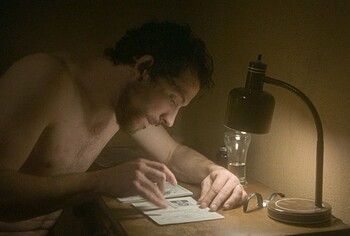 Josh O'Connor shirtless in The Mastermind