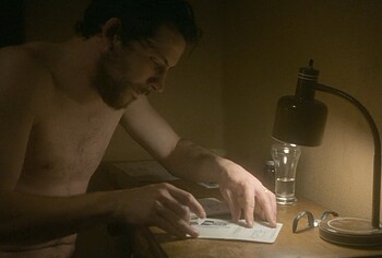 Josh O'Connor shirtless in The Mastermind