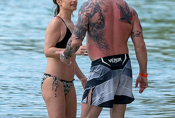 Tom Hardy shirtless on a beach