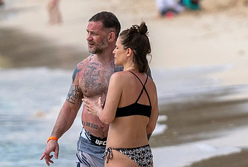 Tom Hardy shirtless on a beach