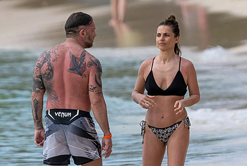 Tom Hardy shirtless on a beach