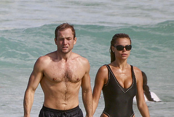Taron Egerton shirtless beach pics