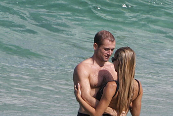 Taron Egerton shirtless beach pics