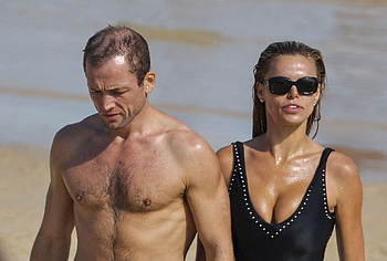 Taron Egerton shirtless beach pics