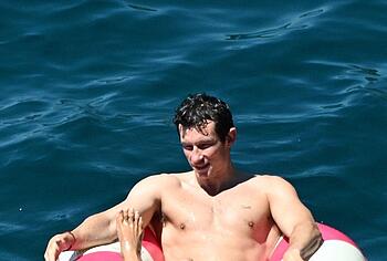 Callum Turner shirtless beach pics