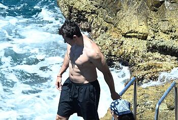 Callum Turner shirtless beach pics